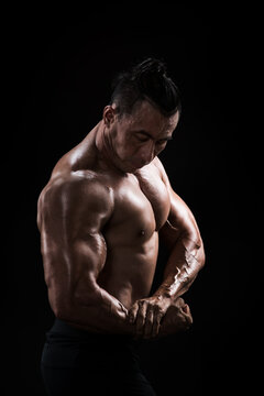 Portrait of muscular male bodybuilder..