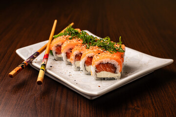 Photo of sushi dish and preparation of sushi for consumption and menu