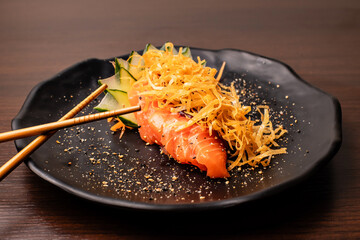 Photo of sushi dish and preparation of sushi for consumption and menu