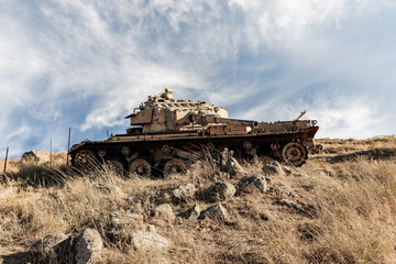 The remains  of Israeli tank destroyed during Yom Kippur War in the Valley of Tears near border...