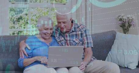 Animation of financial data processing over senior caucasian couple using laptop - Powered by Adobe