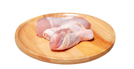 Raw fresh chicken wings or drumsticks chRaw fresh chicken wings or drumsticks chicken on a wooden plate. on transparent background. side viewicken on a wooden plate. Top view. side view