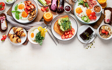 Healthy breakfast eating concept, various morning food on light background