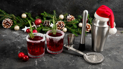 Red christmas cocktail with cranberries in a glasses.