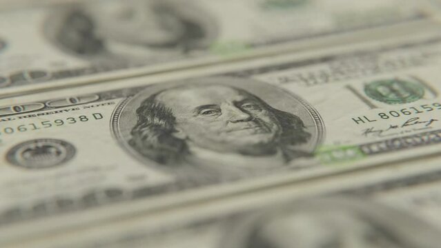 Close up of stacks upon stacks of one hundred dollars