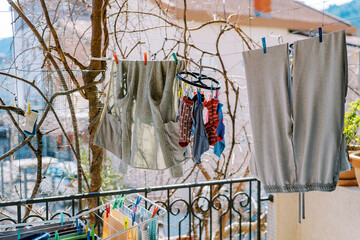 Laundry is dried on the clothesline on the terrace