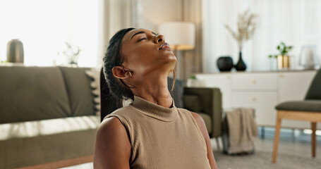 Yoga, breathing and woman stretching in home, living room with calm meditation in apartment....