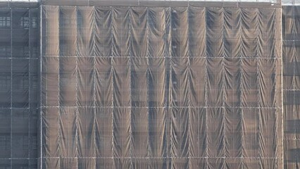 Tokyo, Japan - October 19, 2023: Safety net for outer wall repairment
