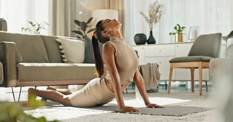 Fototapete Rund Home, yoga and woman stretching back on floor in living room with peace in apartment. Holistic, exercise and girl workout for zen mindfulness, wellness and breathing for mental health or stress © N Felix/peopleimages.com