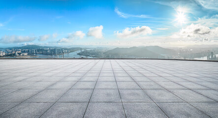 Square brick floor and Macau Financial District skyline background © zhao dongfang