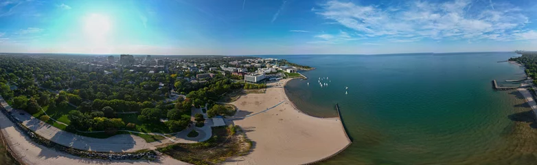 Tuinposter High resolution panoramic drone aerial image of Evanston and its shores of the Michigan lake © Oren