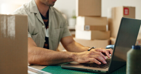 Man, laptop and hands typing in logistics, small business or supply chain for online order or...