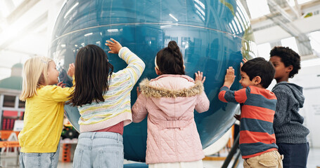 Children, world map and geography for learning, earth and school classroom. Kindergarten, students...