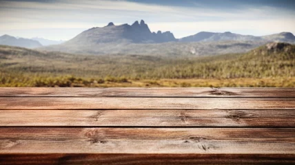 Cercles muraux Mont Cradle The empty wooden brown table top with blur background of Cradle mountain in Tasmania. Exuberant image. generative AI