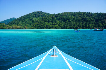 Speed boat bow while heading with beautiful water and blue sky to Moo Koh Surin island, Thailand....
