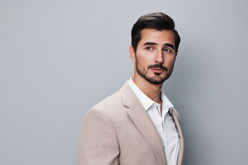 man businessman suit portrait smiling handsome copyspace happy male beige business