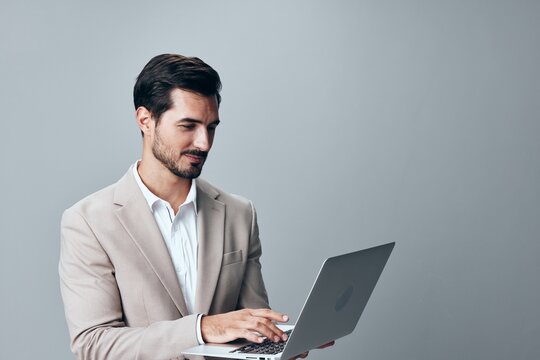 man copyspace suit internet business freelancer job laptop young computer smiling