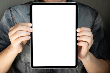 man holding and showing a tablet with a white screen and empty items in hand And his screen is...