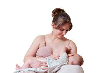 Woman mother breastfeeds an infant baby sitting on a home sofa, isolated on a white background. Mom feeds milk toddler baby in living room. Kid aged six months
