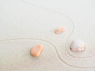 Zen Pattern Background Sand Garden japanese Stone Pebble Abstract Texture White Beach Spa Aroma Japan Nature Top View Space, Concept for Stability Still Balance Meditation Yoga Harmony Wellness.