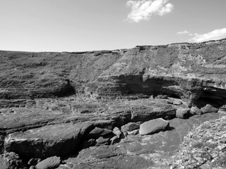 Cliffs and green hills background, rocks and laguna, beauty in nature. Vacation trip wallpaper