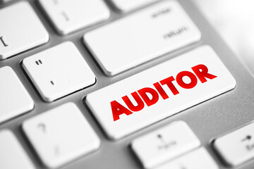 Auditor is a person authorized to review and verify the accuracy of financial records and ensure that companies comply with tax laws, text concept button on keyboard