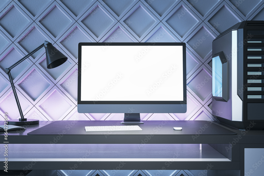Poster creative gamers desktop with empty white computer screen, lamp and system unit on decorative blue wa