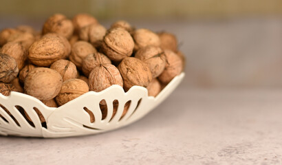 Harvest of walnuts close-up. Autumn