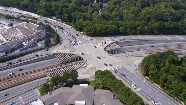 Drone shot of the Georgia 400 Freeway intersecting with Lenox Road.