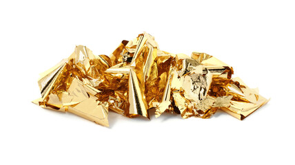 Pile of edible gold leaf on white background