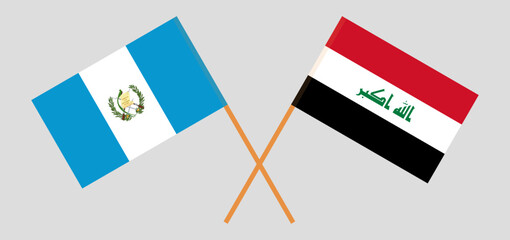 Crossed flags of Guatemala and Iraq. Official colors. Correct proportion