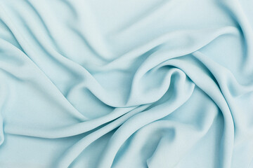 Waving blue fabric background, blank blue fabric texture background