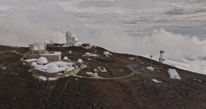 Maui Hawaii Aerial v27 establishing drone flyover and around Haleakalā High Altitude Observatory Site, a science city on the mountain summit above the clouds - Shot with Mavic 3 Cine - December 2022