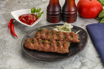 Kebab with beef served onion