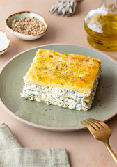 Lasagna with cheese and spinach. Italian food. Vegetarian food.