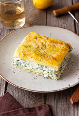 Lasagna with cheese and spinach. Italian food. Vegetarian food.