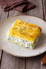 Lasagna with cheese and spinach. Italian food. Vegetarian food.