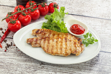 Grilled pork steak with ketchup