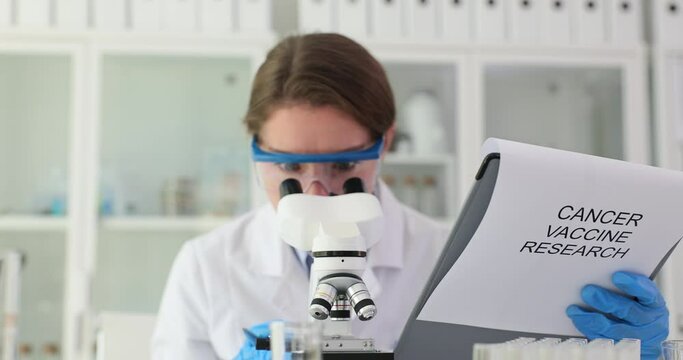 Scientist conducts experiment on effect of vaccines and cancer in laboratory. Antitumor autovaccine