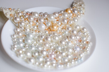 Elegant collection of lustrous pearl white beads, perfect for jewelry and craft projects