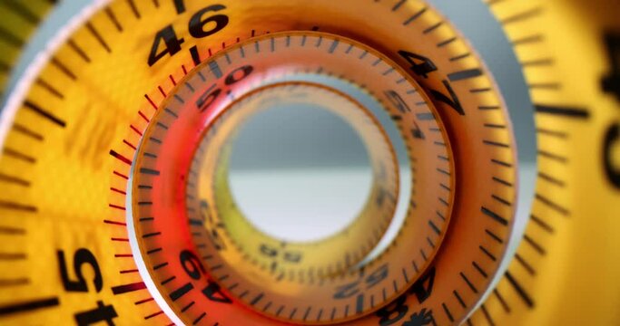 Closeup of yellow spiral measuring tape. Sewing measuring tape