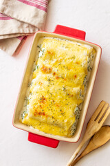 Italian cannelloni with cheese and spinach. Italian food. Vegetarian food.