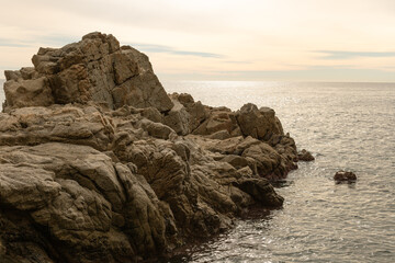 Large granite rock, typical of Costa Brava of Spain, within Mediterranean Sea. Lloret de Mar,...