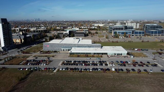 Drone shot of the YMCA sports facility in Quarry Park community in Calgary, on a beautiful sunny day.