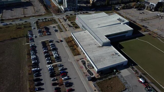 Aerial shot of the parking lot by the YMCA sports facility in Quarry Park community in Calgary.