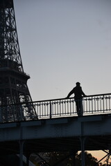 person by the eiffel tower