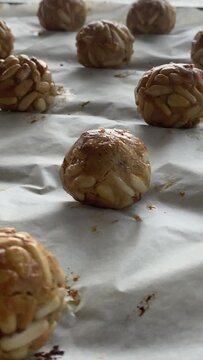 Several pine nut panellets fresh from the oven. Typical snack eaten on the feast of All Saints in Catalonia. 