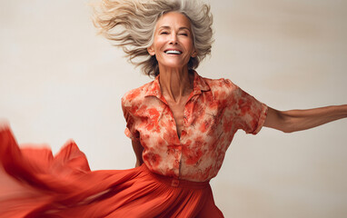 Joyful Elderly Lady Radiating Positive Energy as She Dances Gracefully in a Flowing Elegant Red Dress