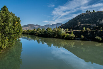 Ebro river with mountain reflection in Rioja province 
