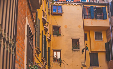 Fototapeta na wymiar Landscape of Venice views, concept of vacation in Italy. Old part of city center. Ideas for journey. 
